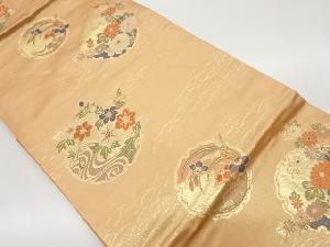 雪輪に菊・草花・流水模様織出し名古屋帯